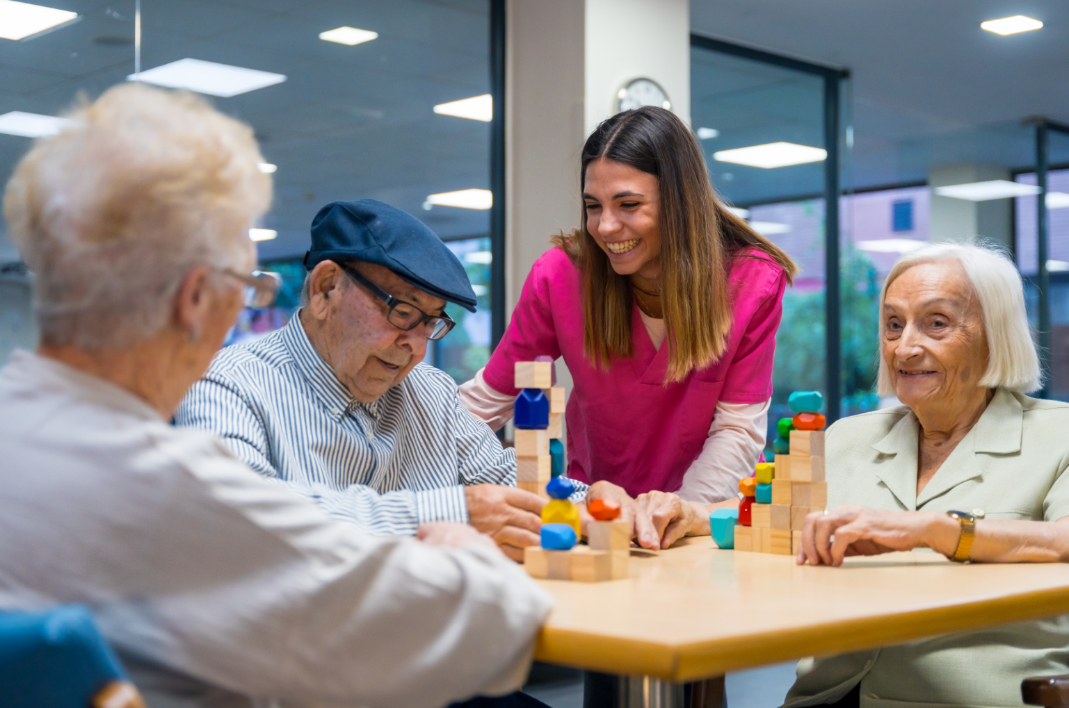 Care professional speaking with a client at home
